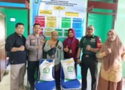 Bhabinkamtibmas Kawal Penyaluran Beras Cadangan Pangan Pemerintah di Pabundukang
