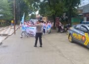 Polsek Pangkajene Kawal Devile Pembukaan Porseni SMP Negeri 02 Pangkajene