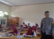 Bhabinkamtibmas dan Babinsa Pantau Pendistribusian Makanan Bergizi Gratis bagi Pelajar di Tumampua