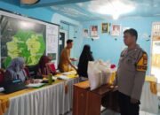 Bhabinkamtibmas Desa Lanne Kawal Penyaluran Bantuan Pangan, Ingatkan Warga Jaga Kamtibmas