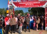 Bhabinkamtibmas dan Babinsa Amankan Jalan Santai Semarak HUT RI ke-81 di Alesipitto