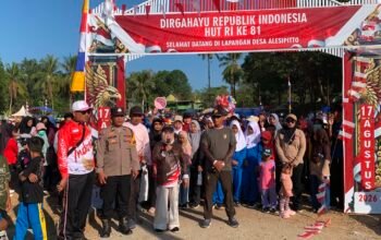 Bhabinkamtibmas dan Babinsa Amankan Jalan Santai Semarak HUT RI ke-81 di Alesipitto