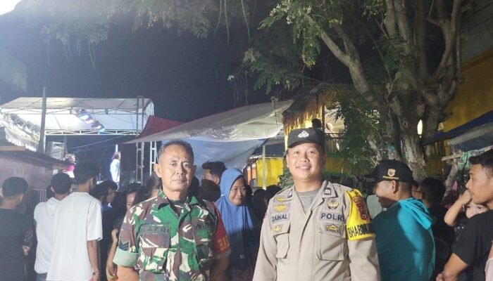 Wujud Sinergitas TNI-Polri-Masyarakat, Bhabinkamtibmas dan Babinsa Amankan Hajatan di Pulau Karanrang
